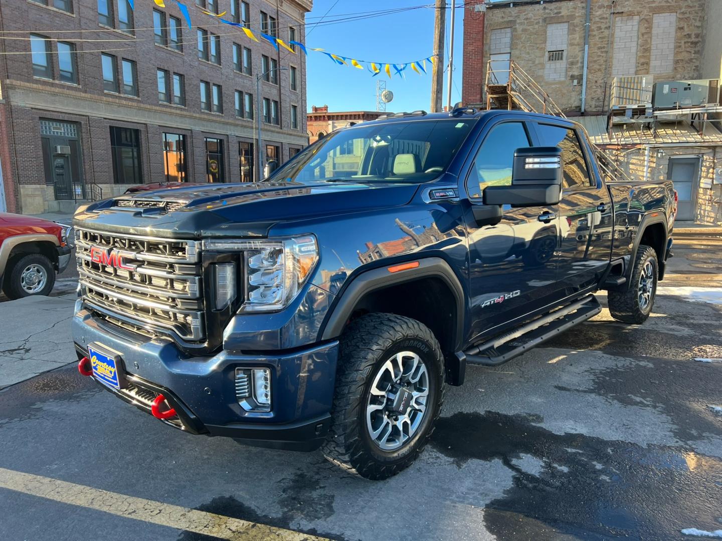 2022 Blue /Charcoal GMC Sierra 2500HD AT4 Crew Cab 4WD (1GT49PE70NF) with an 6.6L Gas engine, automatic transmission, located at 116 5th Avenue South, Lewistown, MT, 59457, 47.063877, -109.427879 - Photo#0